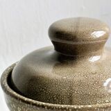 Gray and white speckled ceramic pot.