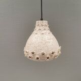 Ceramic hanging lamp in creamy white color that almost looks like a corral