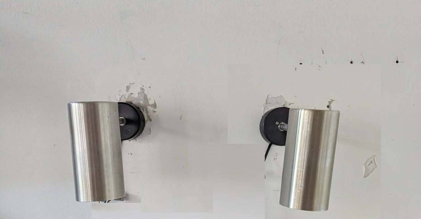 Pair of brushed aluminium tube wall lights from the 70s.