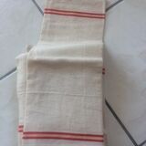 8 off-white towels with thin red and yellow stripes