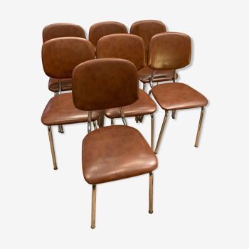 Série de 7 chaises en skaï