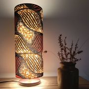 Tube lamp with wooden base and wax boho-ethnic fabric