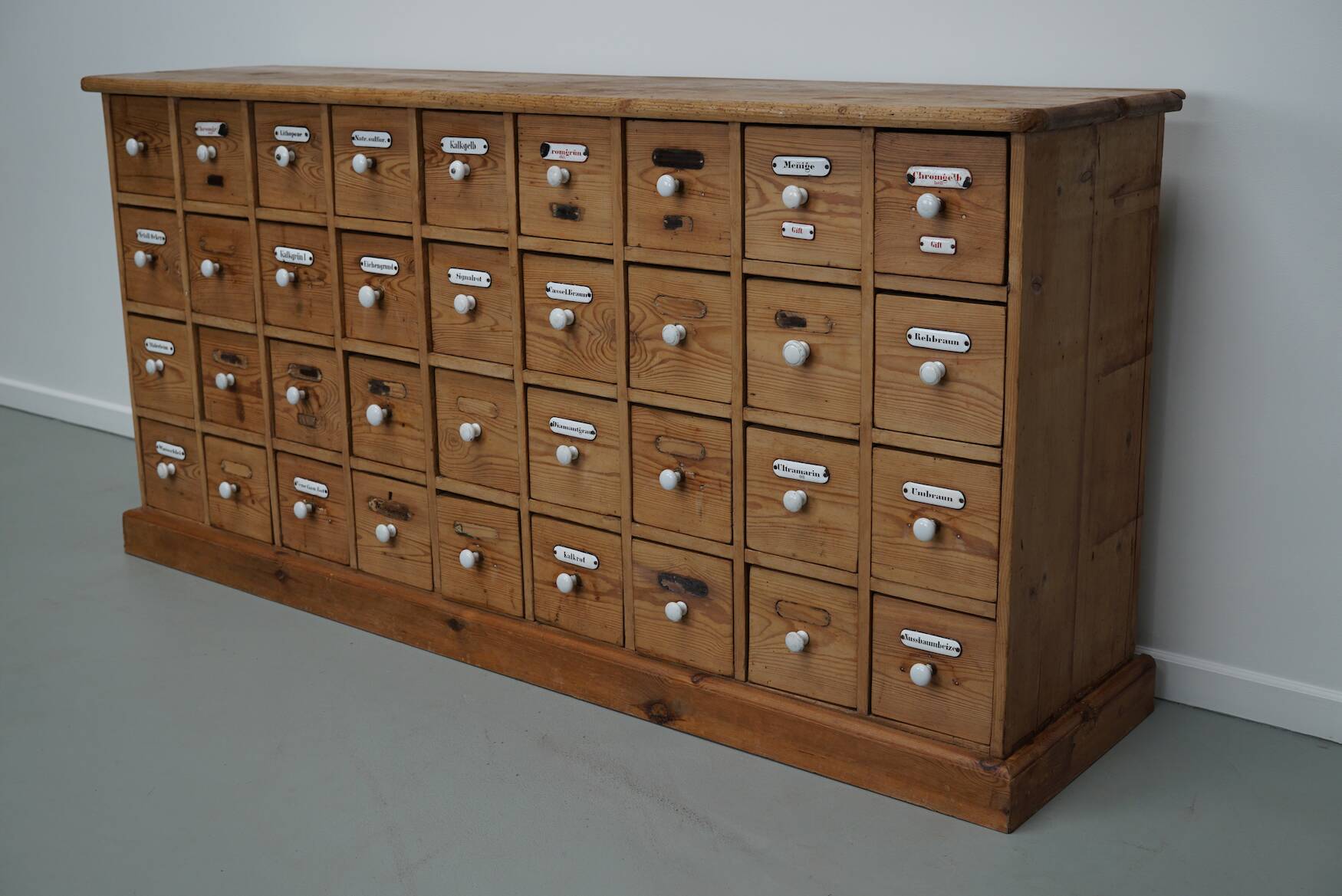 Antique German Pine Apothecary Cabinet with Enamel Shields, 1900s