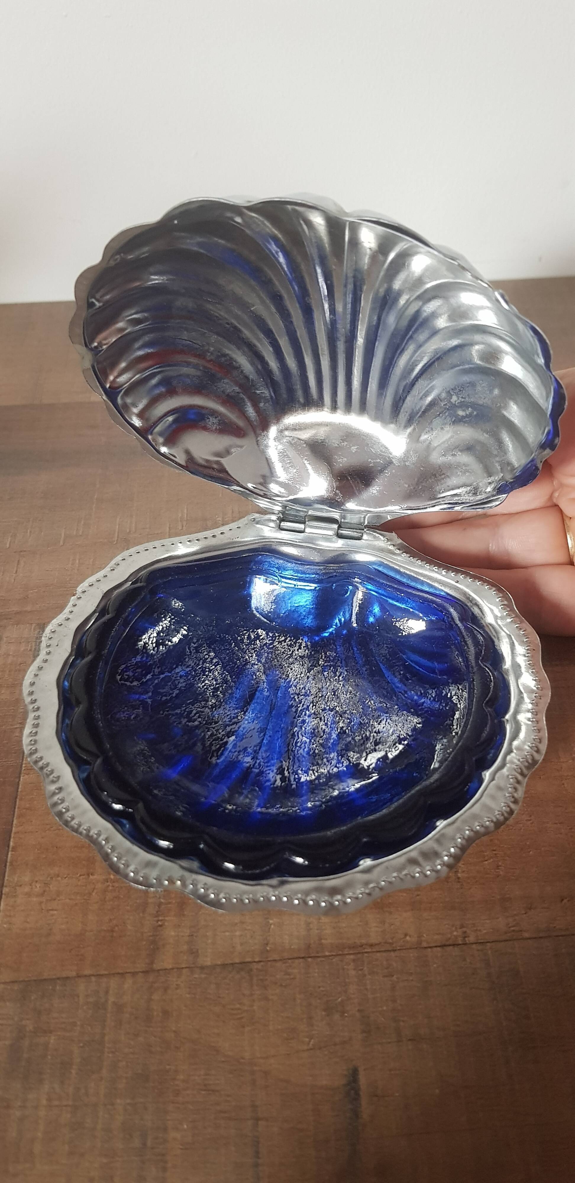 Vintage ashtray in silver metal and a blue glass part that goes inside in the shape of a saint jacques shell