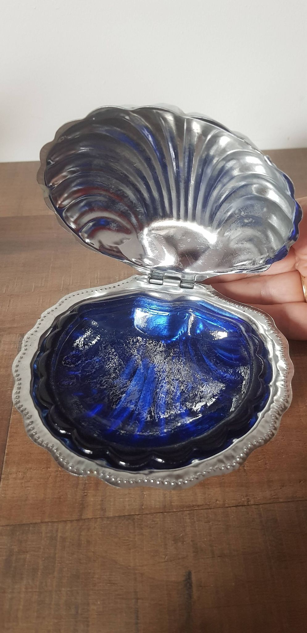 Vintage ashtray in silver metal and a blue glass part that goes inside in the shape of a saint jacques shell