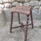 Wooden stool with turned legs