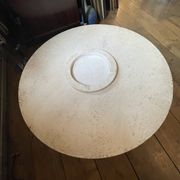 Round travertine coffee table, attributed to Angelo Mangiarotti, central cylindrical leg, 1970s