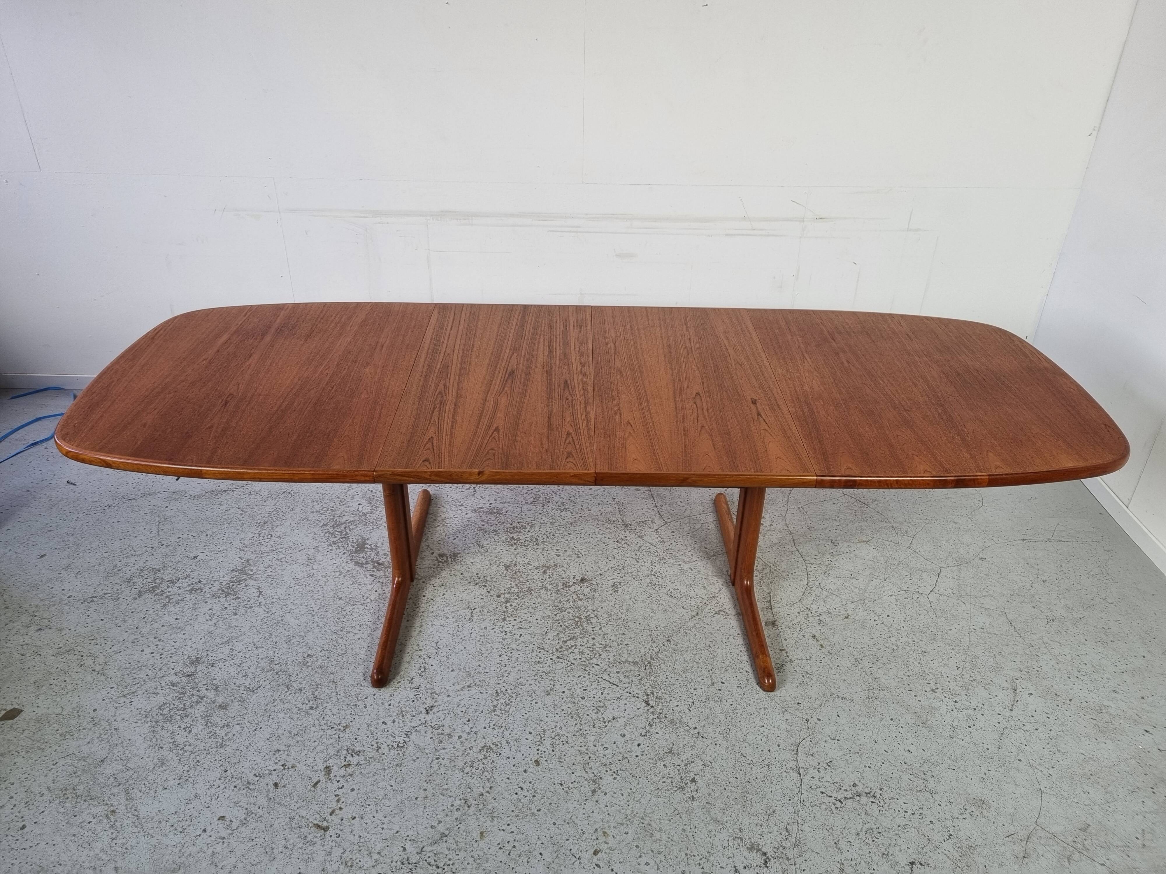 Extendable teak dining table from Dyrlund, Denmark 60s