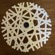 Snowflake candlestick by Laure Krayenbuhl and Kosta Boda for Nestlé.