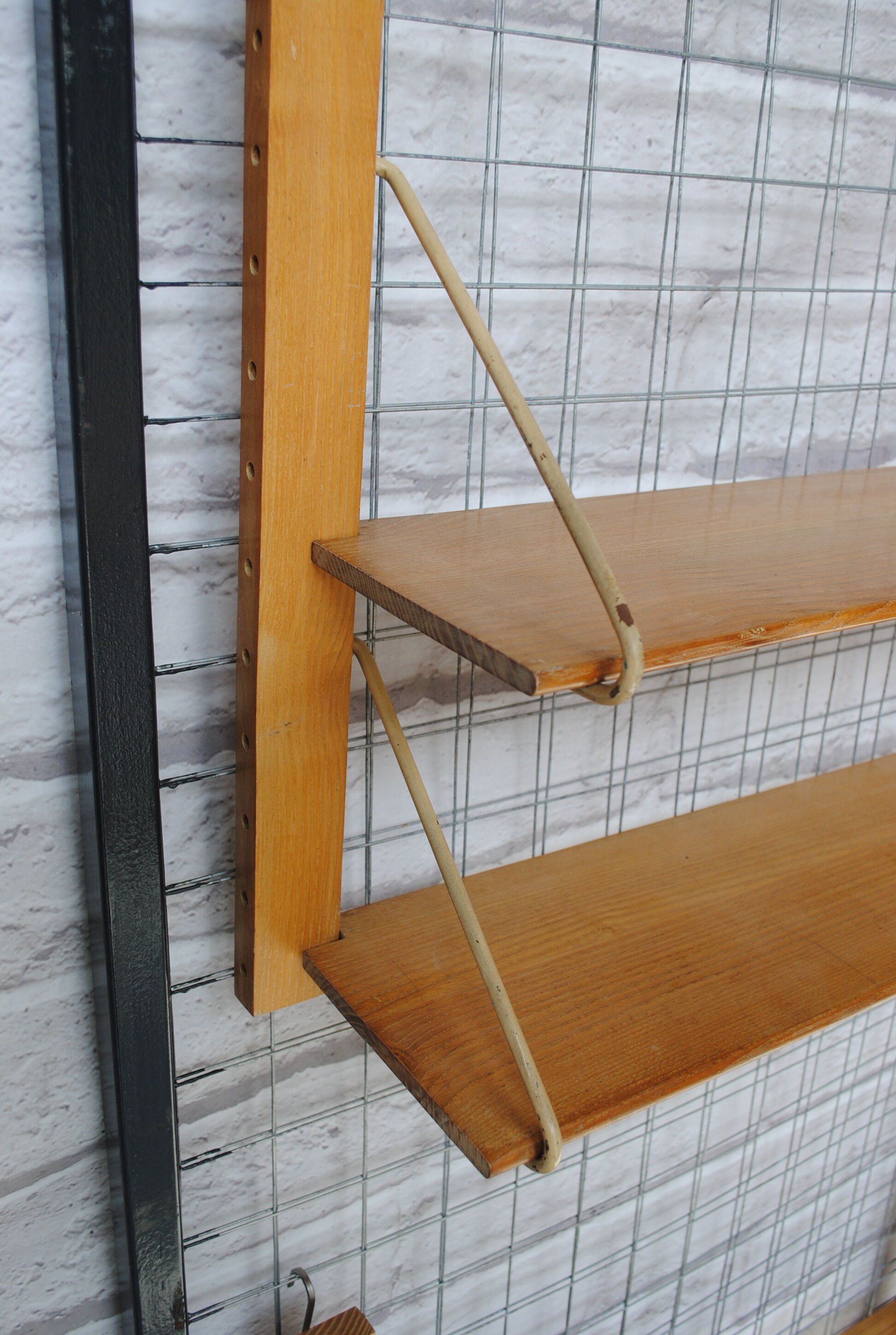 Wooden and metal wall shelf