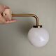 Vintage globe wall lamp in white opaline