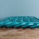 Emerald green braided slip trivet and bottle holder, knife holder