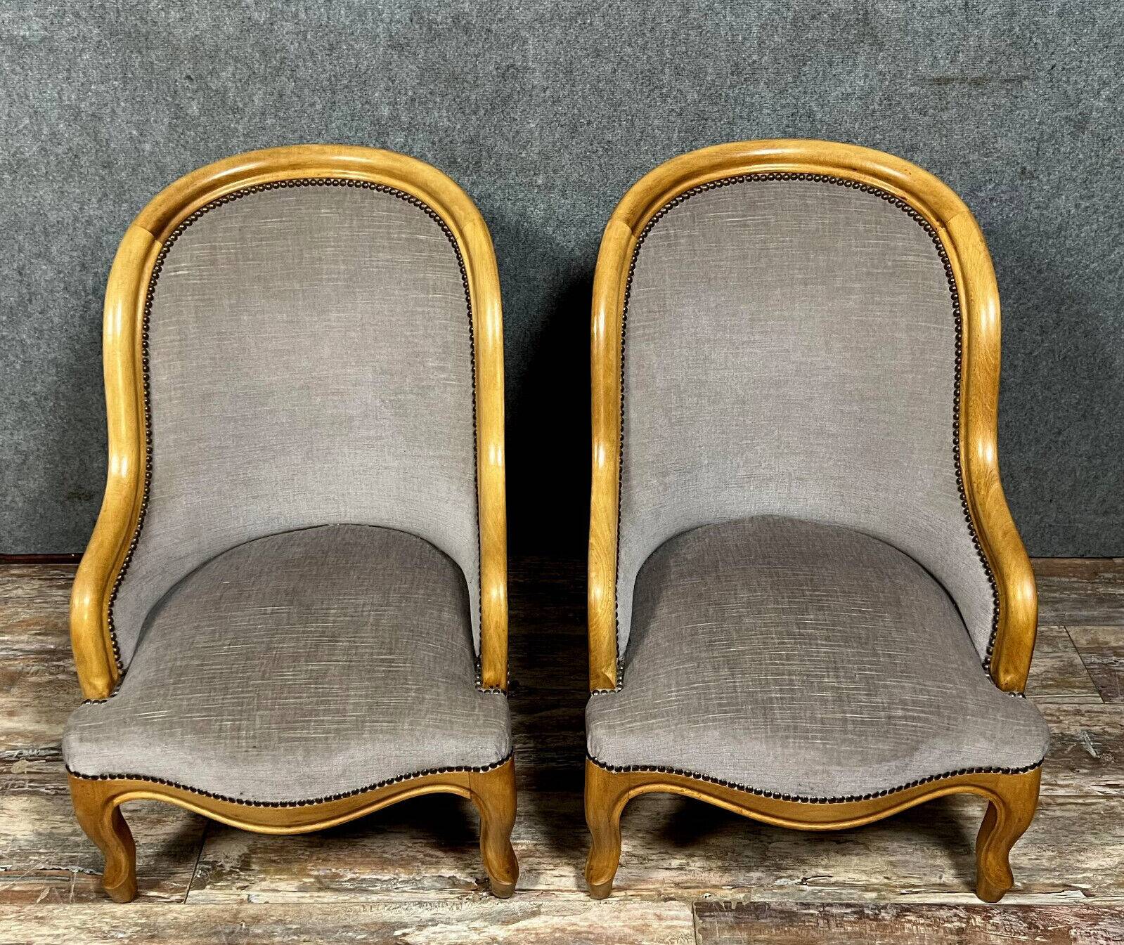 Pair of Louis XV style fireside chairs in cherry wood circa 1970