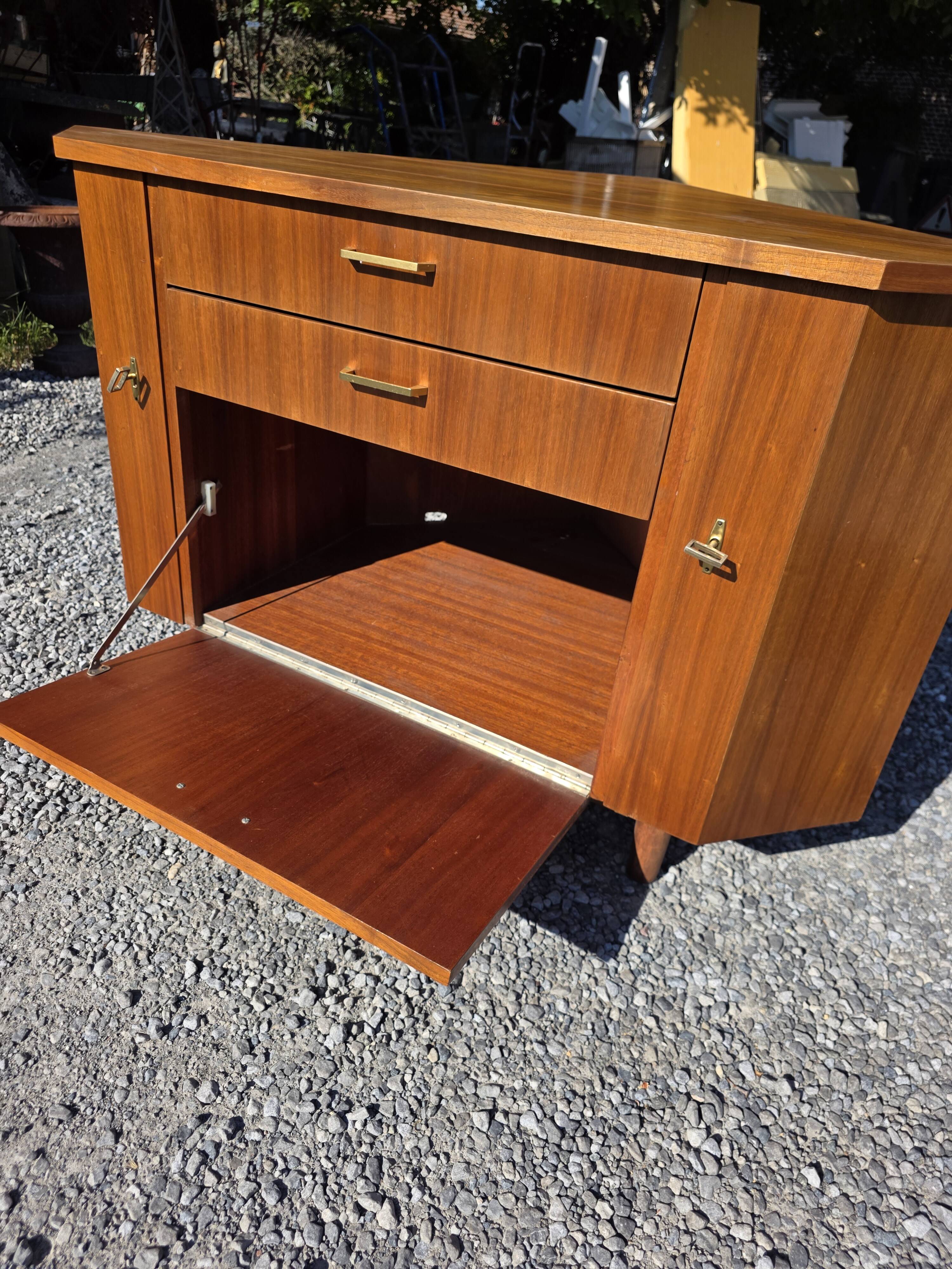 Scandinavian corner unit in teak from the 1960s.