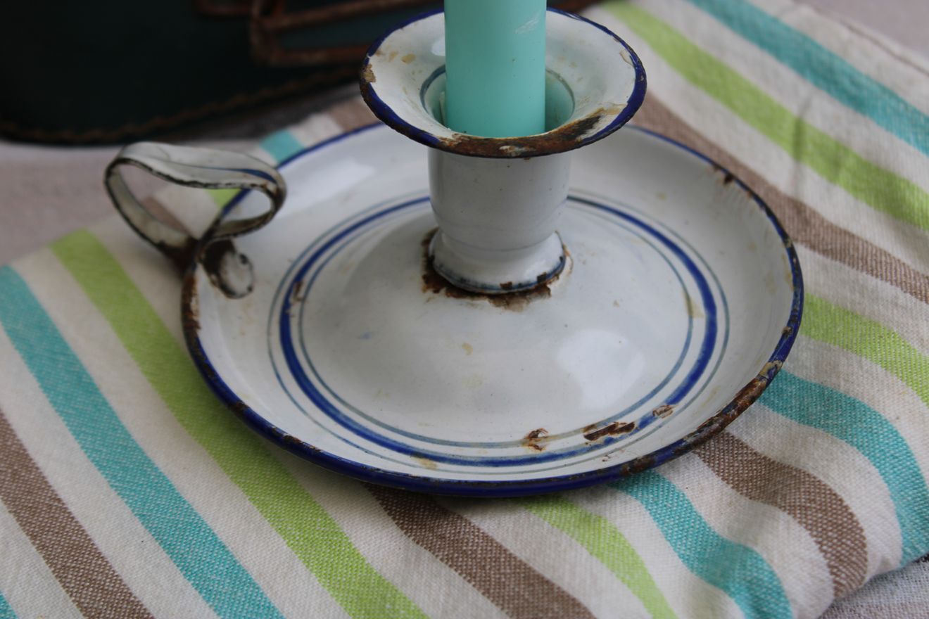 Old enamel candle holder