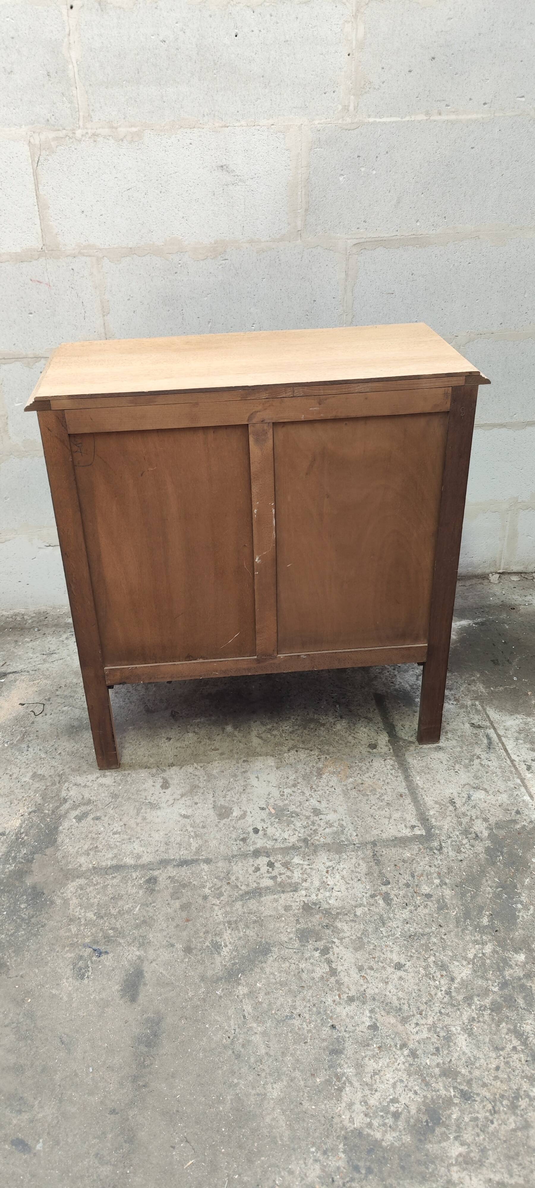 Old three-drawer chest of drawers in raw oak