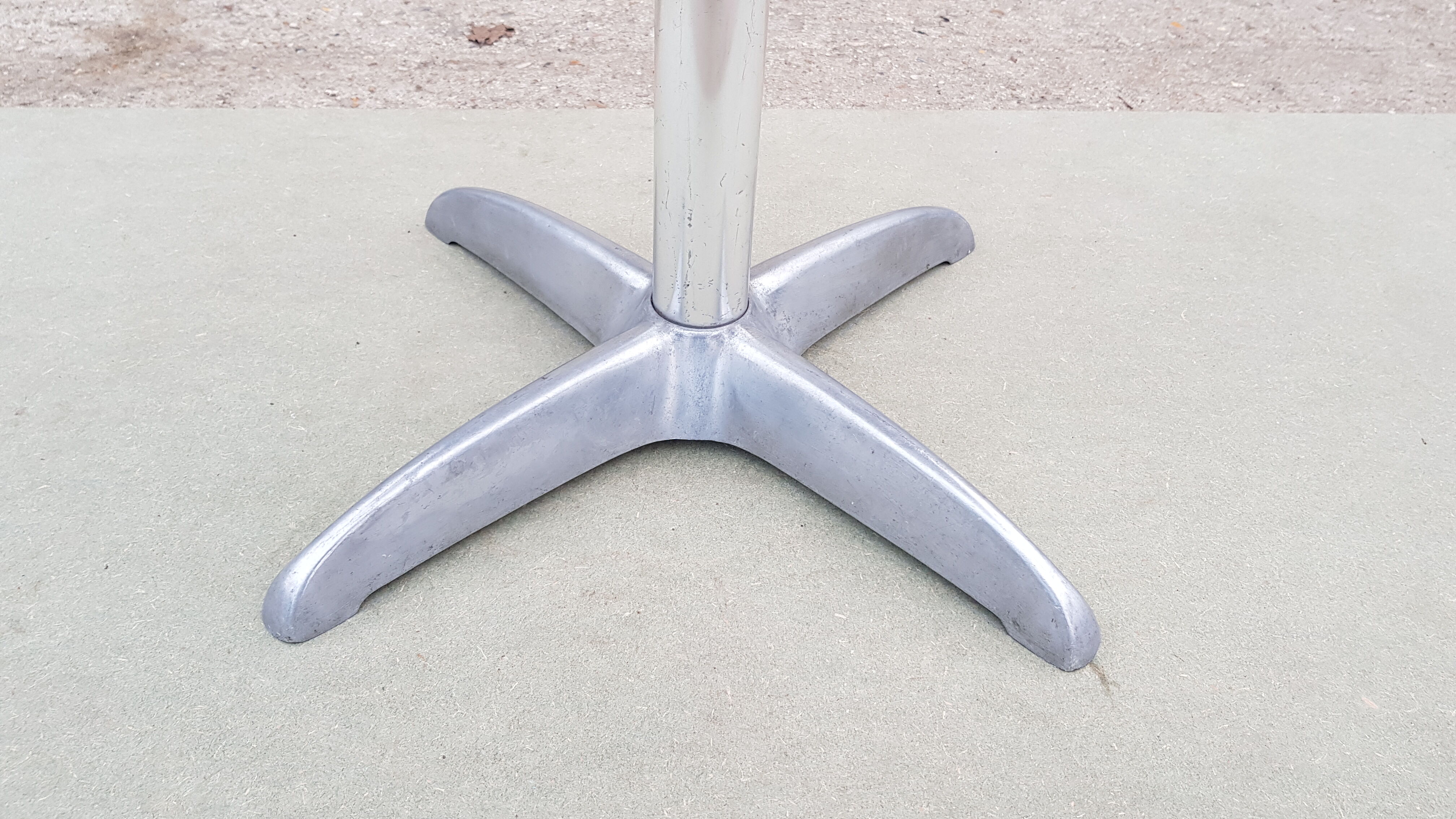 Foldable bistro table with teak top and aluminum base