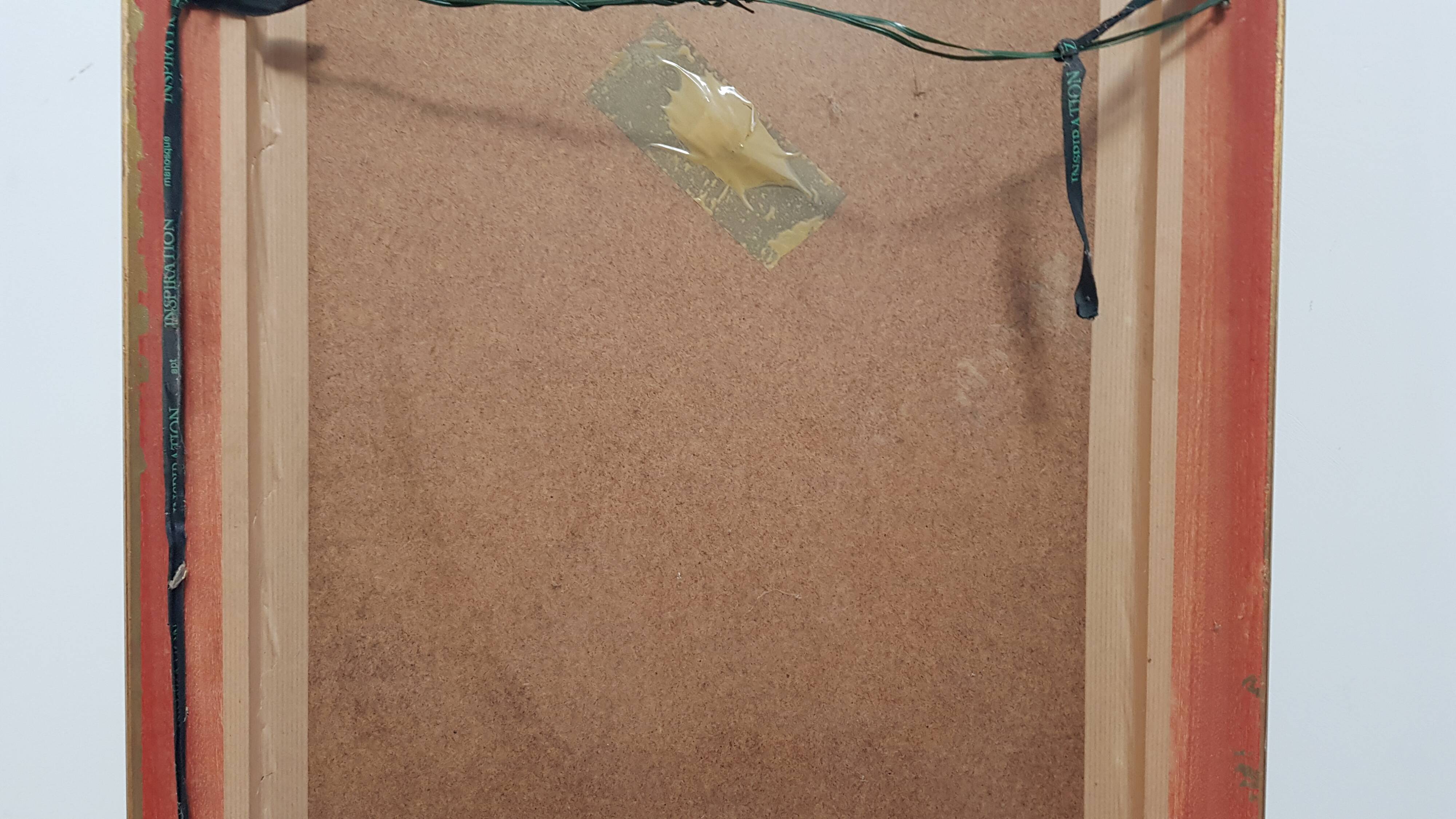 Mirror in gilded stucco wood and beveled glass