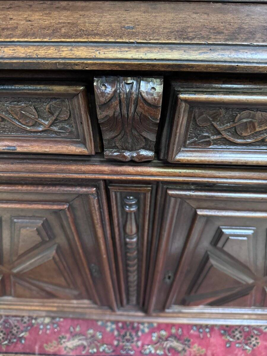 Four-panel buffet from the Louis XIII period in solid walnut.