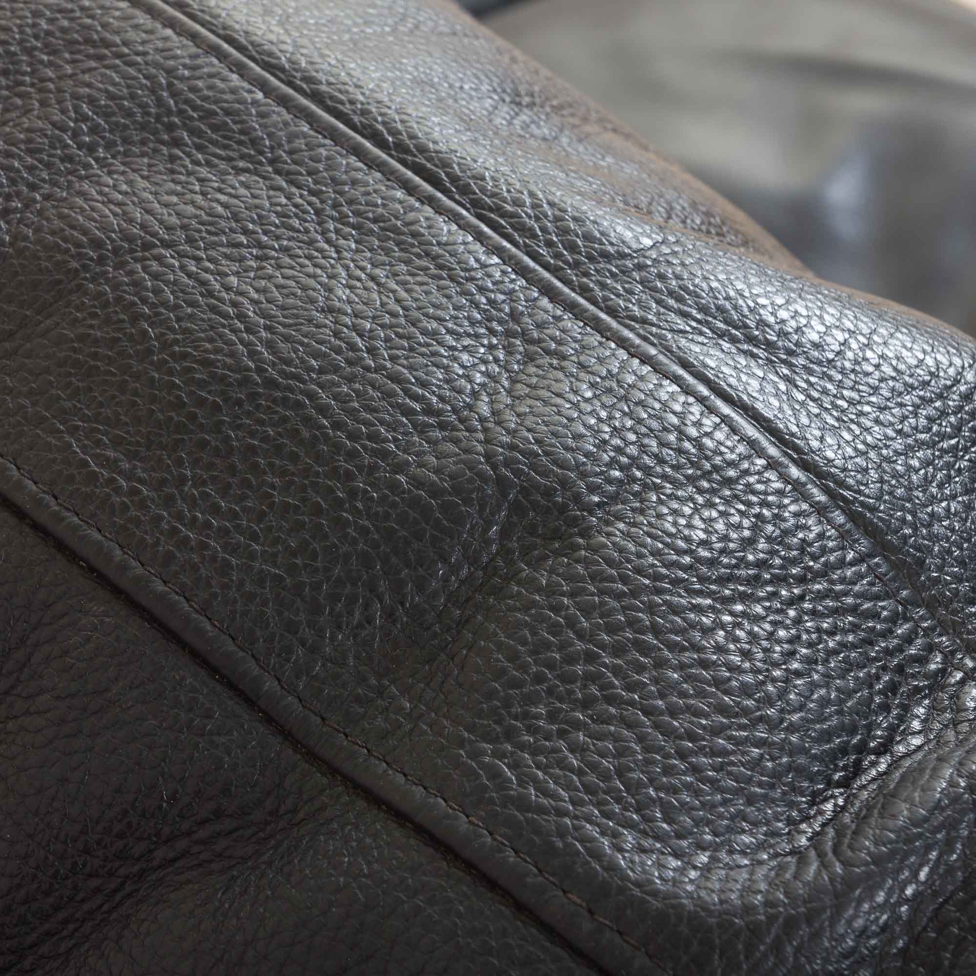 Black leather mid century 2,5 seater sofa