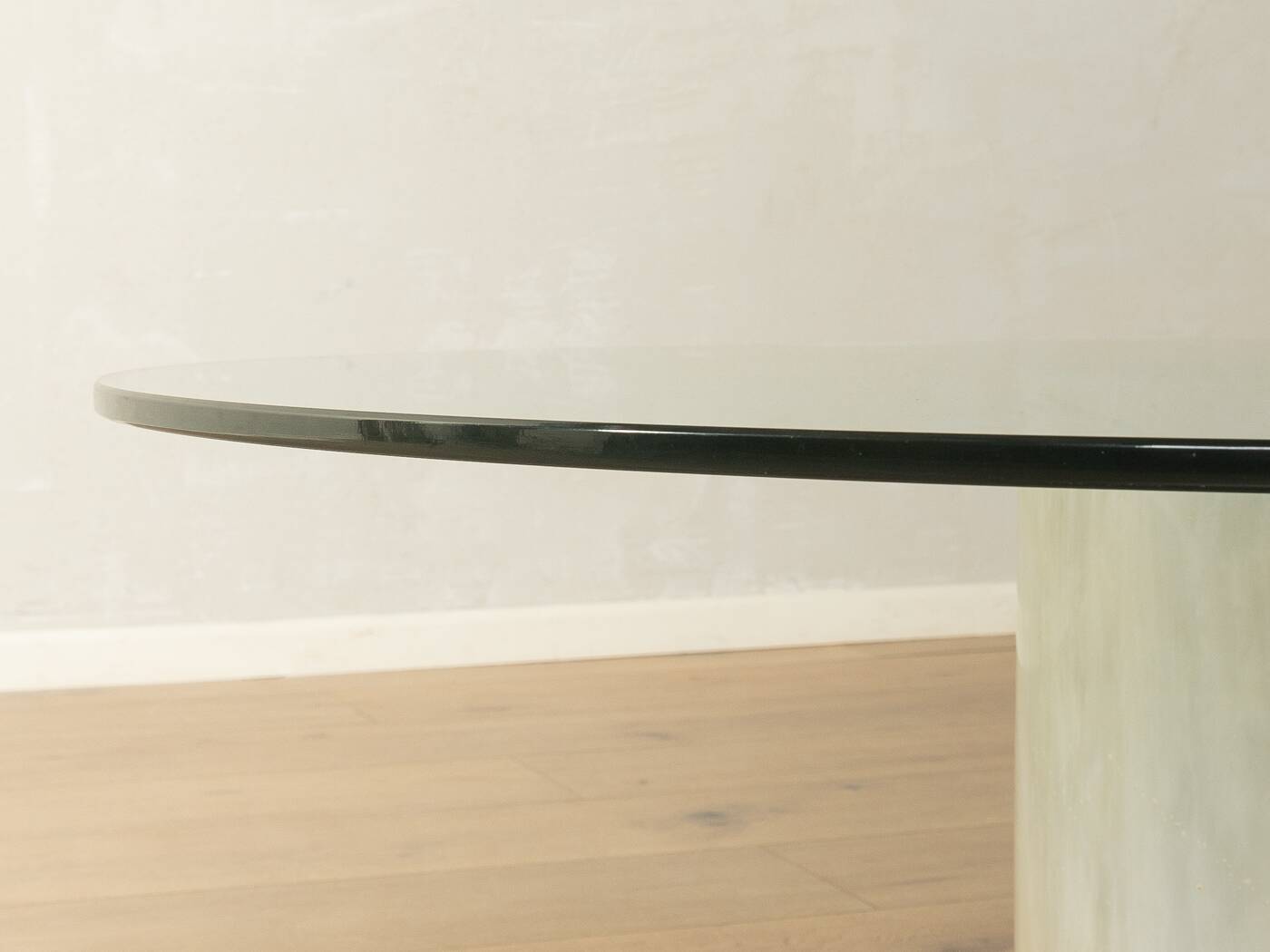 Postmodern coffee table from the 1980s with marble base and glass top