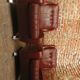 Couple de fauteuil en simili cuir rouge bordeaux, annees 70