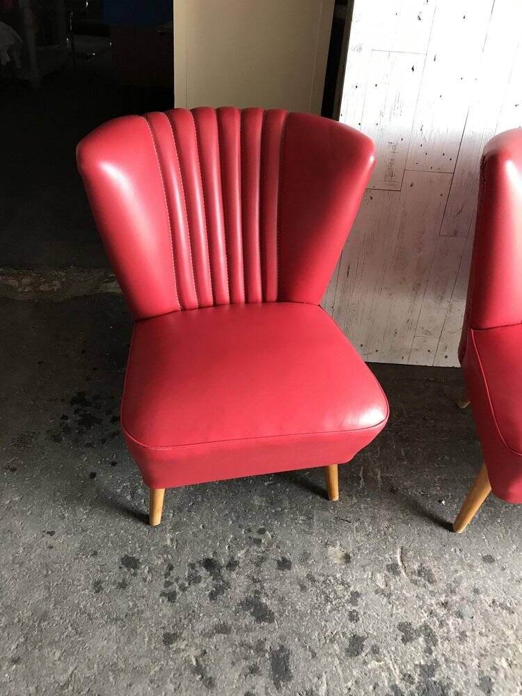 Mid-century cocktail chair in red vinyl and beech, 1950s design from Czechoslovakia.