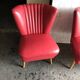 Mid-century cocktail chair in red vinyl and beech, 1950s design from Czechoslovakia.