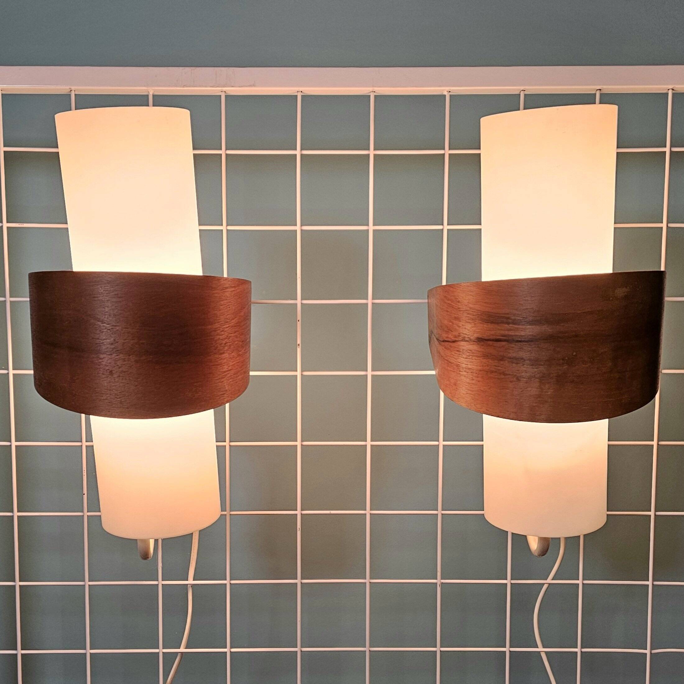 Louis kalff (1897-1976) for philips, pair of nx40 wall lights in wood, opaline glass, and lacquered metal,