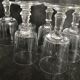 11 glasses and 1 wine carafe