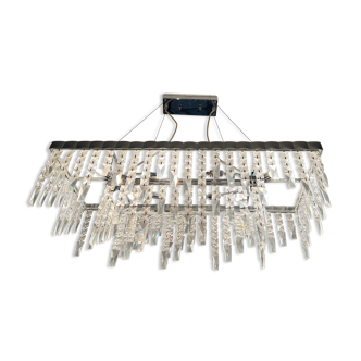 Glass chandelier and metal design