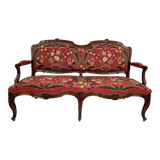 Louis XV style bench upholstered with petit point tapestry, early 19th century