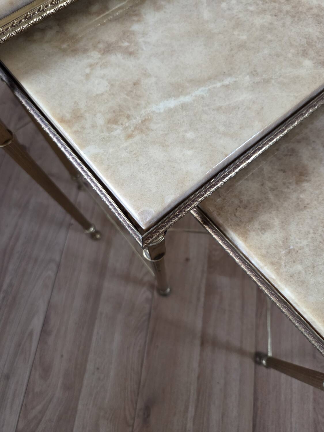 Nested tables in brass and marble, 1950.
