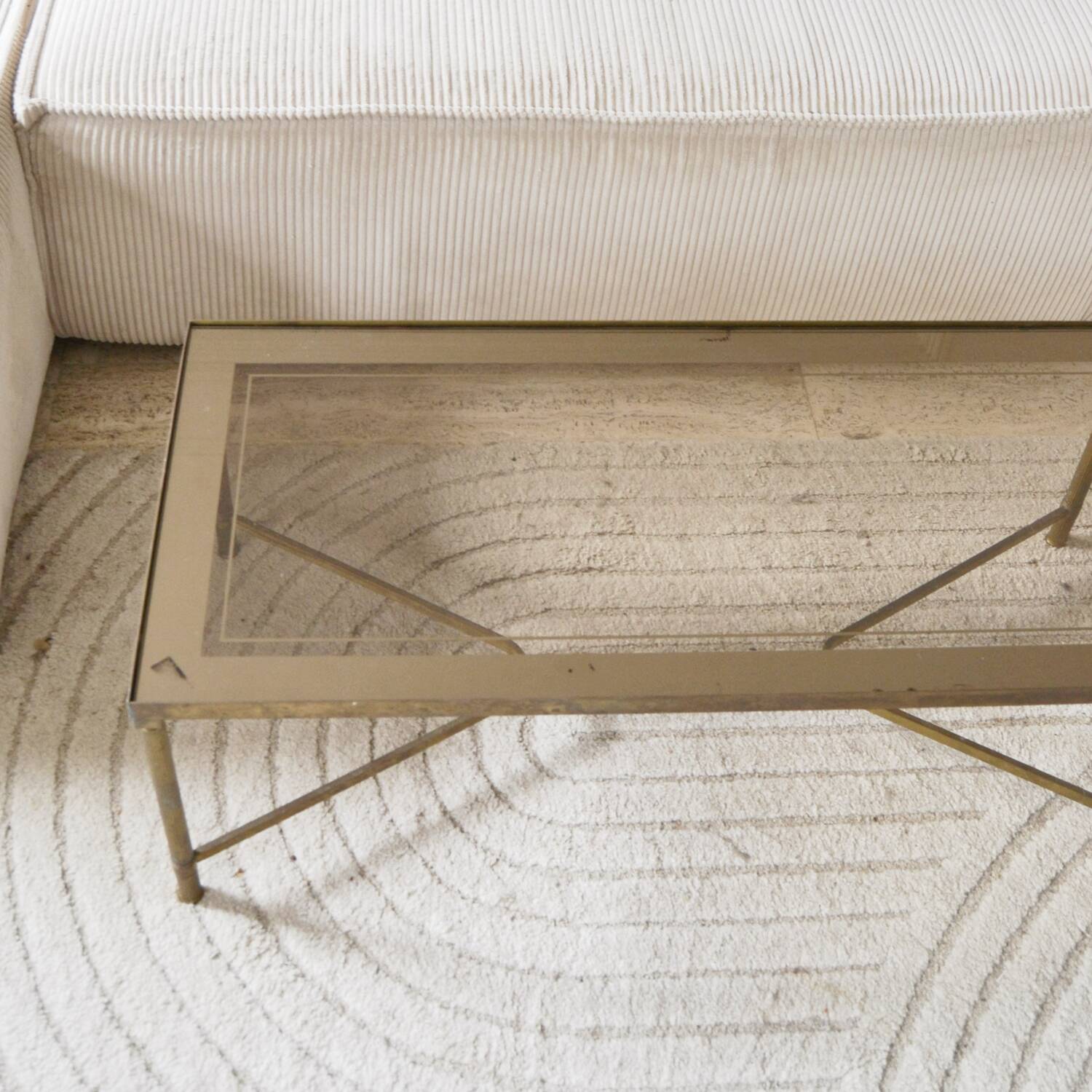 Coffee table in gold metal and glass