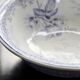 Old basin in white and purple earthenware - Floral decoration