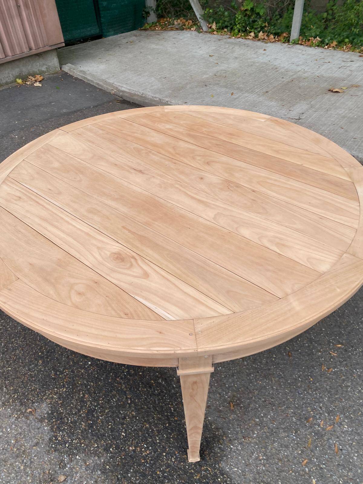 Round extendable dining table stripped in cherry wood Louis XVI René Trotel 1