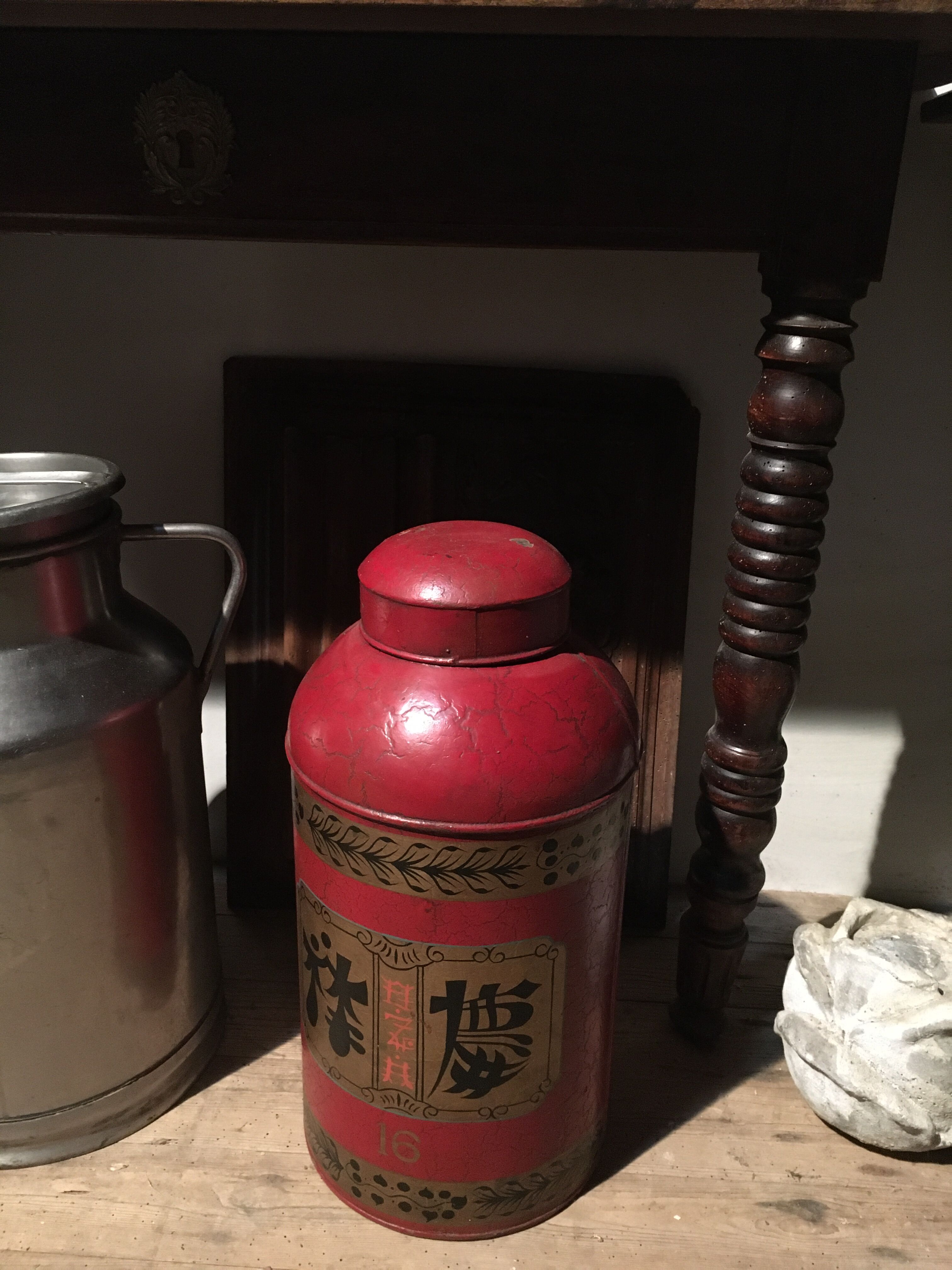 Asian red metal pot with lid