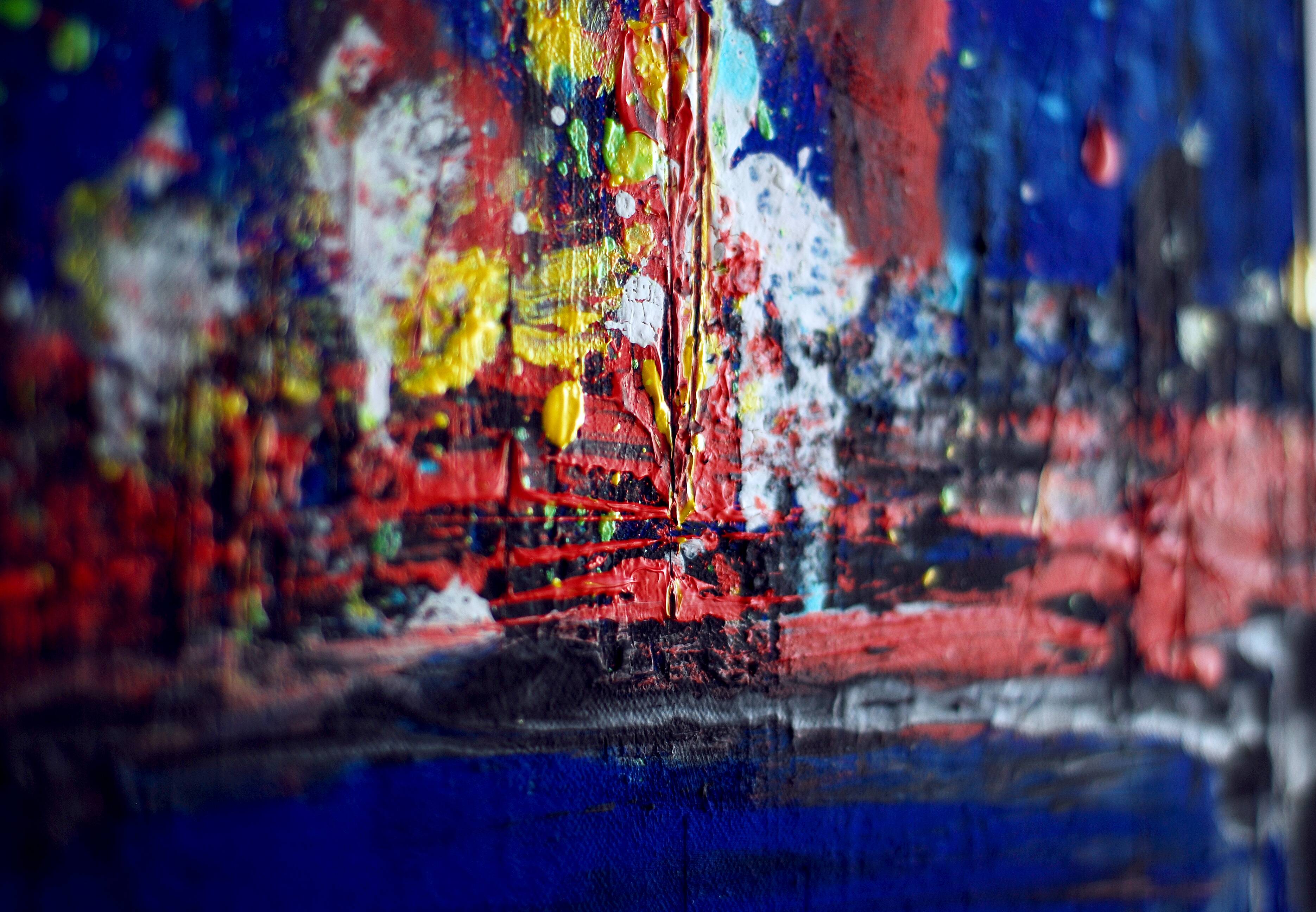 Abstract blue and red colors acrylic painting on stretched canvas