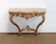 Console murale en bois doré style Louis XV, milieu XXème