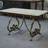 Side table with a gilt wrought iron base attributed to Gilbert Poillerat, with a travertine top, 1940s