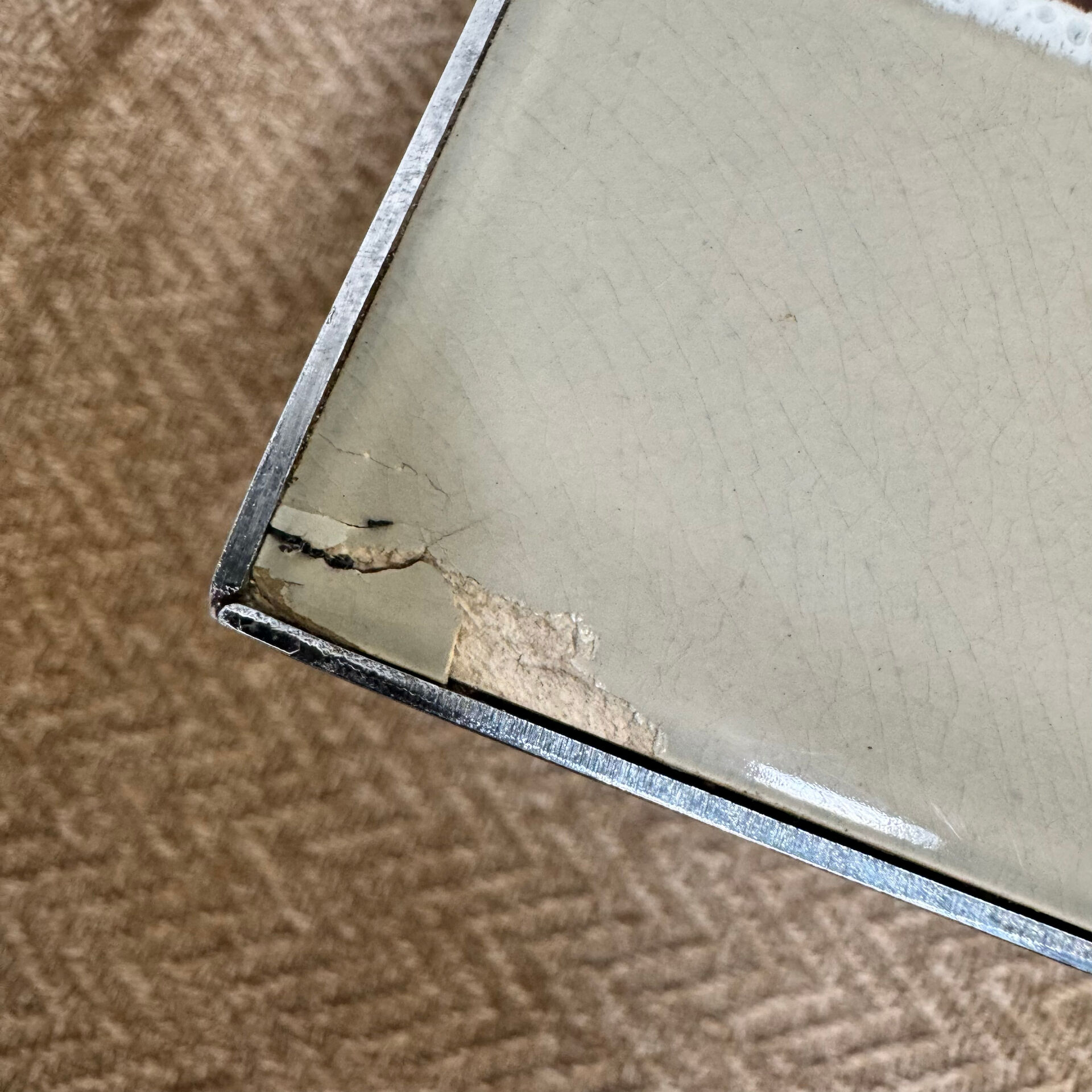 Vintage coffee table from the 60s and 70s in ceramic, chrome metal, and wood.