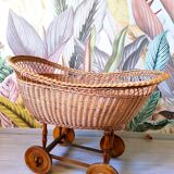 Wicker cradle on wheels