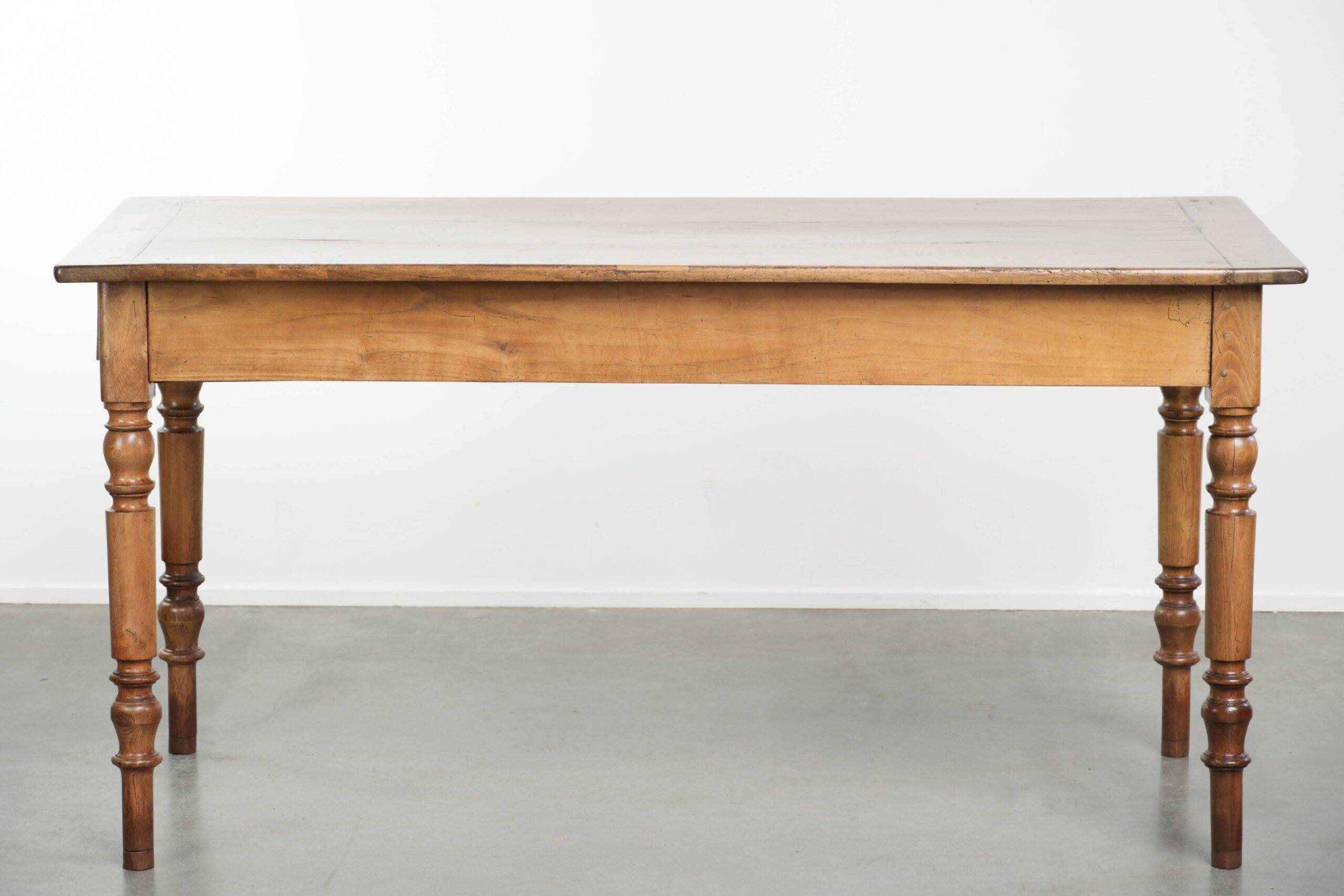 Antique French cherry wood dining table from the 19th century