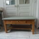 Table basse vintage, piétement, ceinture, tiroir et tablette bois, plateau vert de gris.
