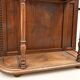Napoleon III entrance hall wardrobe in solid oak with bevelled mirror.