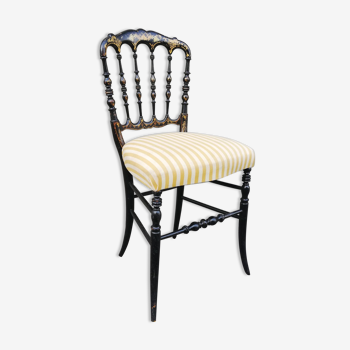 Chaise Napoléon III fin 19ème en bois noirci à motifs dorés