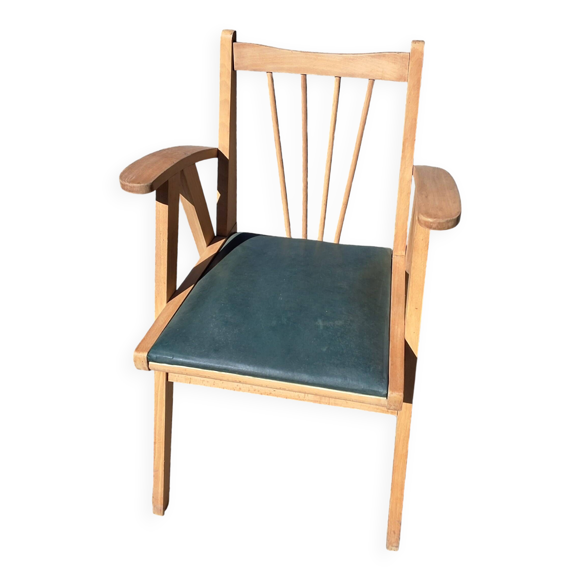 Compass leg armchair