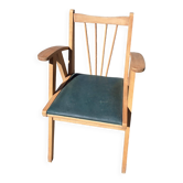 Compass leg armchair