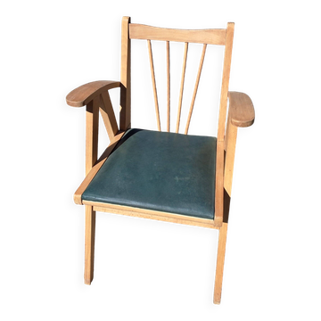 Compass leg armchair
