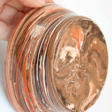 Terracotta cup in mixed earth